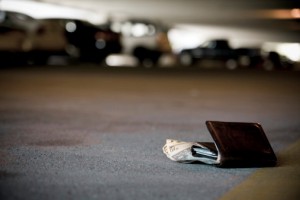 Wallet with money lying in the street